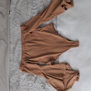 Flared sleeve body suit
